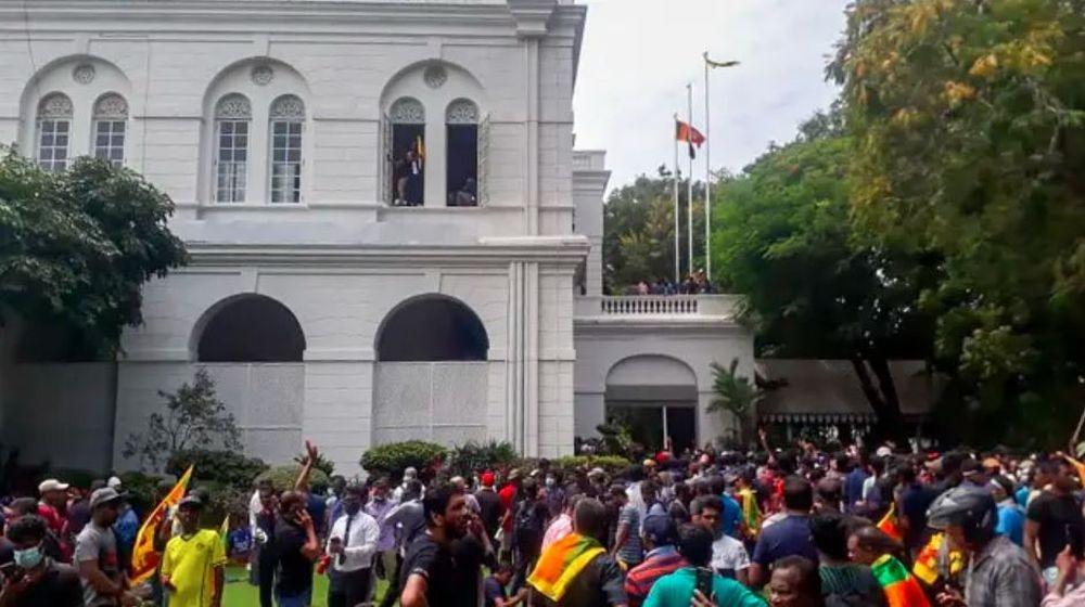 Protestors gather inside the compound of Sri Lanka’s Presidential Palace in Colombo on July 9, 2022. - Sri Lanka’s beleaguered President Gotabaya Rajapaksa fled his official residence in Colombo, a top defence source told AFP, before protesters gathered to demand his resignation stormed the compound. — AFP pic