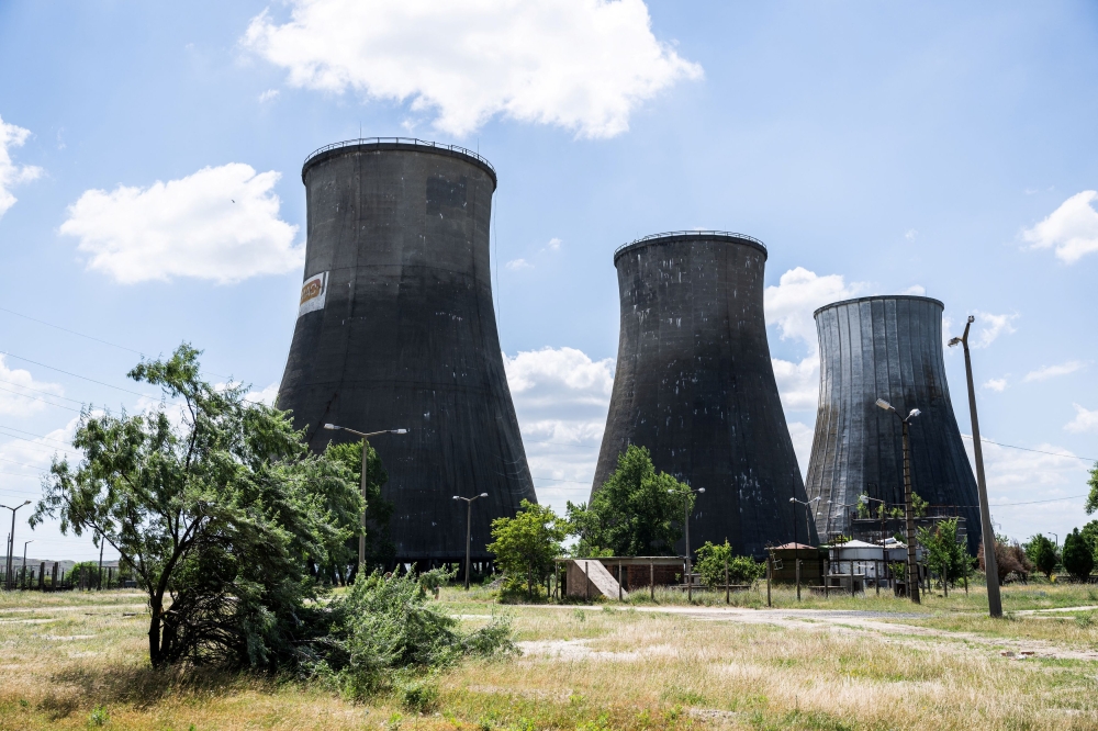Cooling towers are seen at Hungary's derelict Inota thermal power plant in Varpalota, Hungary, June 29, 2023. — Reuters pic