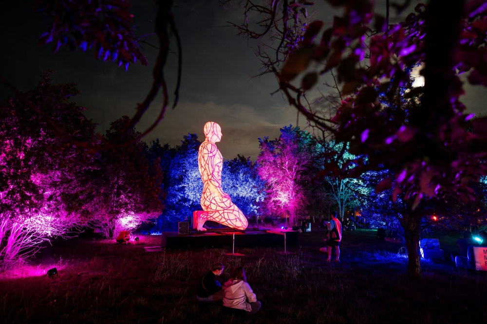 Festivalgoers attend the INOTA music and visual arts festival at an abandoned thermal power plant in Varpalota, Hungary, August 31, 2023. — Reuters pic