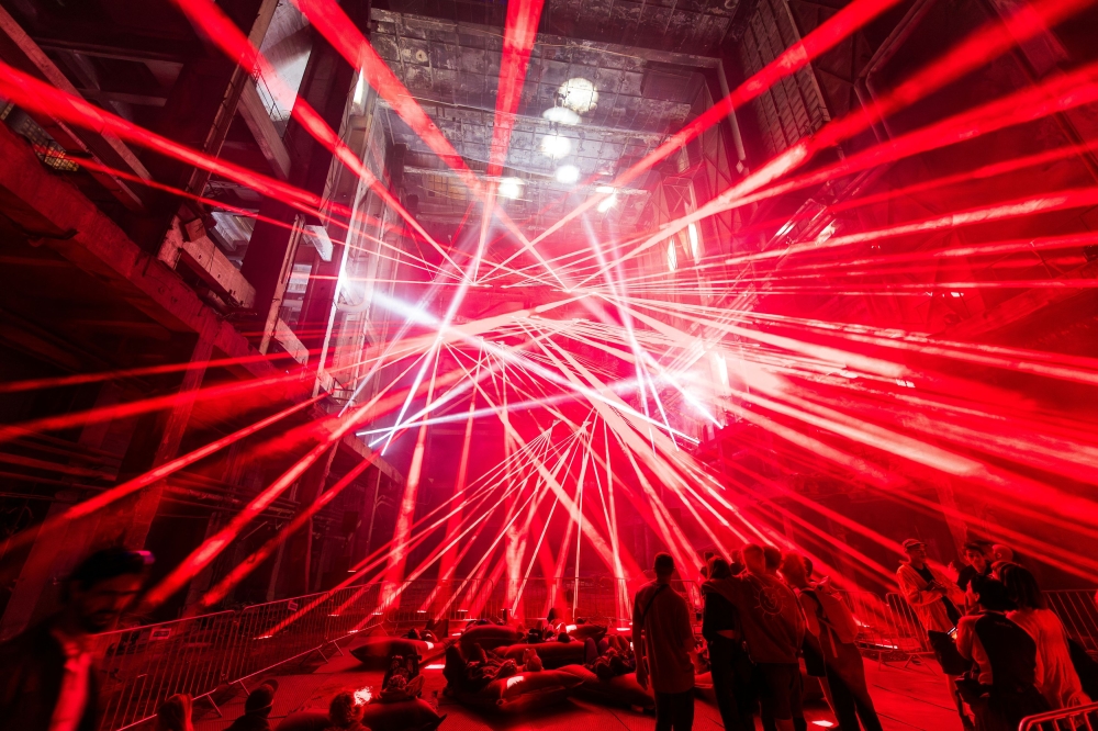 Festivalgoers attend the INOTA music and visual arts festival at an abandoned thermal power plant in Varpalota, Hungary, August 31, 2023. — Reuters pic