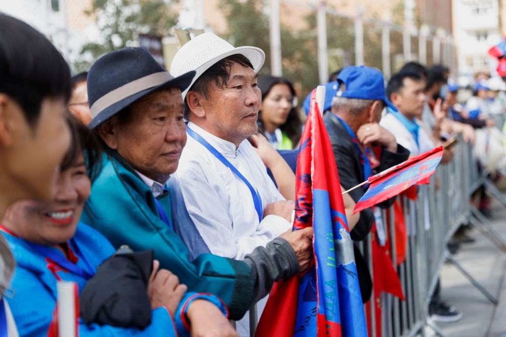 People wait on the day Pope Francis meets with bishops, priests, missionaries, consecrated persons and pastoral workers at the cathedral, during his Apostolic Journey in Ulaanbaatar, Mongolia September 2, 2023. — Reuters pic