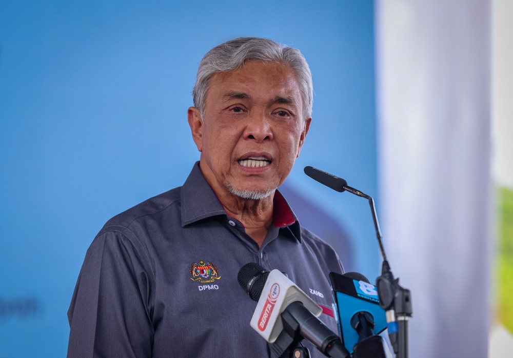 Deputy Prime Minister who is also Minister of Rural and Regional Development Datuk Seri Dr Ahmad Zahid Hamidi speaking at the closing ceremony of the Simpang Jeram Desa Sentuhan Kasih event in Sungai Abong Muar, September 2, 2023. — Bernama pic