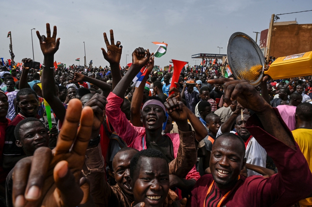 Supporters of Niger’s National Council of Safeguard of the Homeland protest outside the Niger and French airbase in Niamey on September 2, 2023 to demand the departure of the French army from Niger. — AFP pic