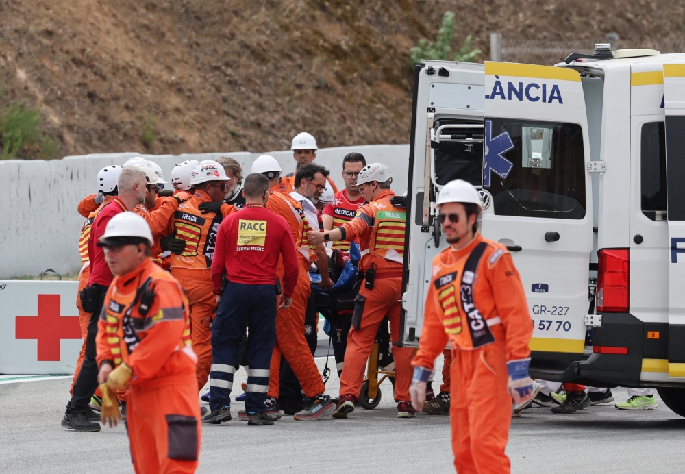World champion Francesco Bagnaia was thrown violently into the air in front of the chasing pack. — Reuters pic
