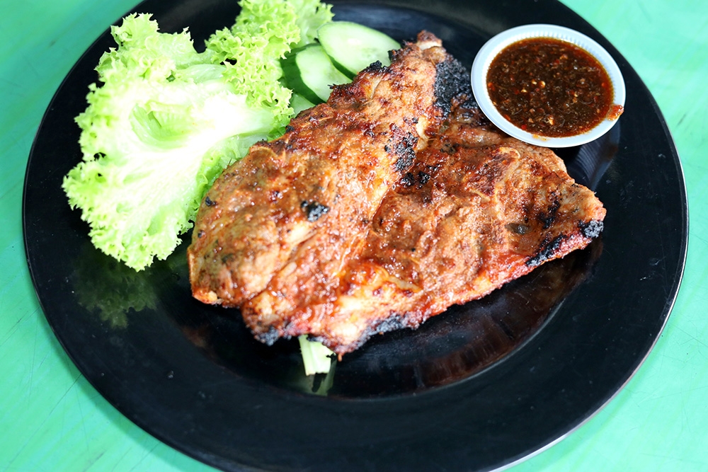 The Kambing Bakaq is packed with flavour but it's not fork tender so use your fingers.