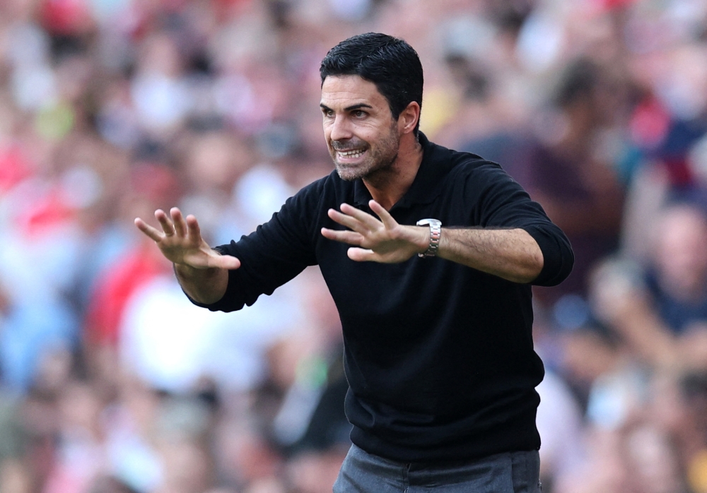 Arsenal manager Mikel Arteta praised his team’s mentality after they sealed a 3-1 stoppage-time win over Manchester United. — Reuters pic