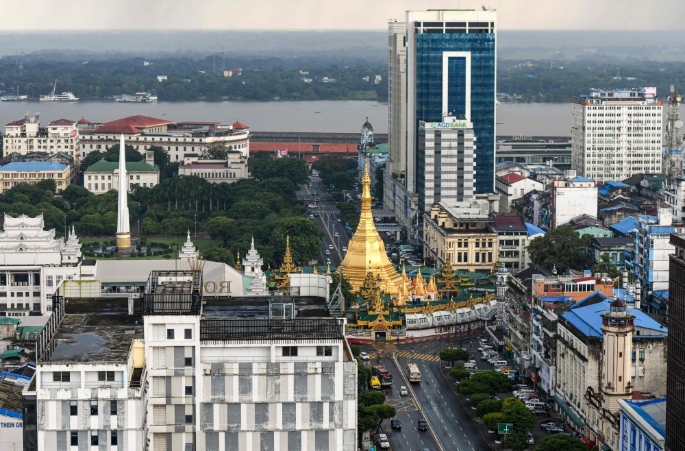 This general view shows residential and commercial buildings in Yangon on August 30, 2023. — AFP pic