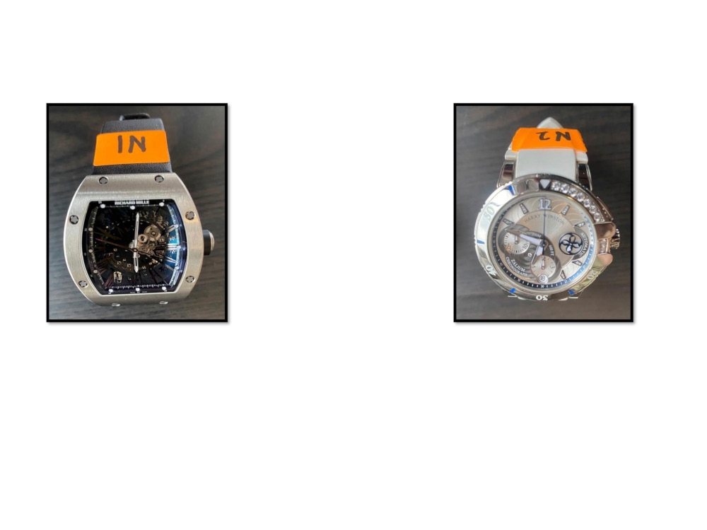 An ultra-luxury Richard Mille watch and an Hermès handbag were among the RM93.2 million worth of assets that were allegedly bought using 1MDB money. — Picture courtesy of Royal Malaysia Police