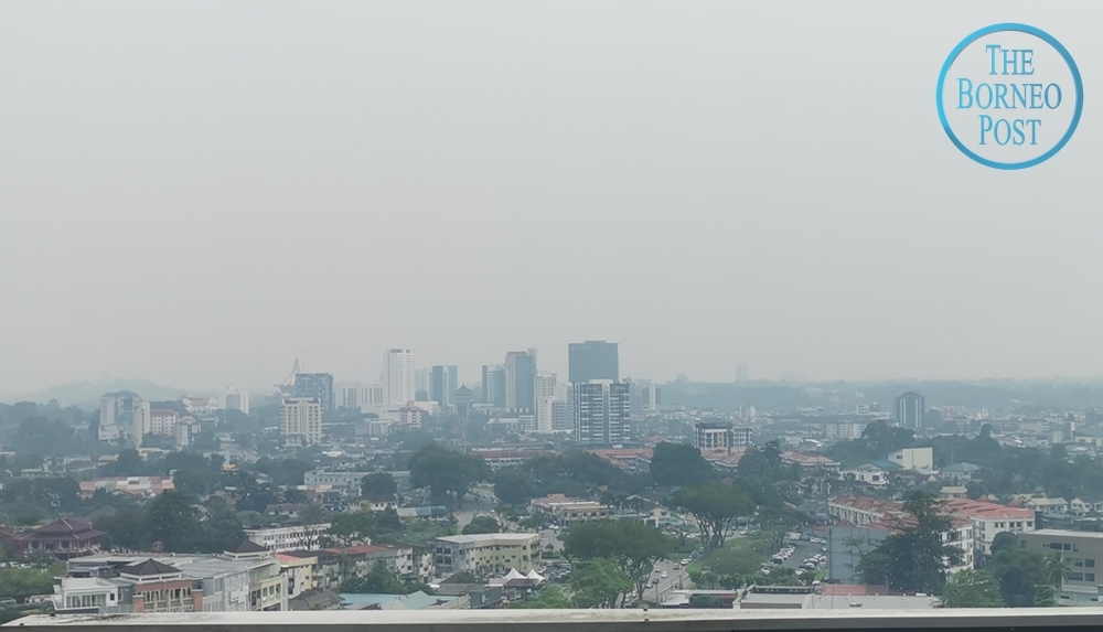 A hazy Kuching skyline is observed from Citadines Uplands Kuching on August 16, 2023. ― Borneo Post pic
