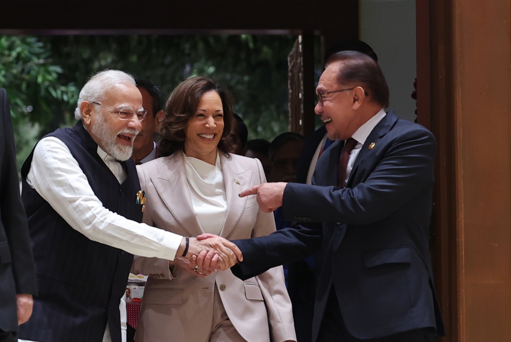 Prime Minister Datuk Seri Anwar Ibrahim (right) with India’s Prime Minister Narendra Modi (left) and US Vice President Kamala Harris at the 13th Asean Summit in Jakarta September 7, 2023. — Bernama pic