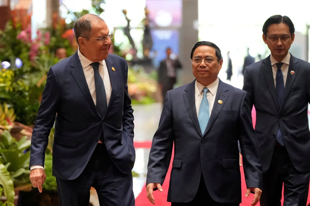 Vietnam Prime Minister Pham Minh Chinh is seen here with Russian Foreign Minister Sergey Lavrov at the East Asia Summit in Jakarta. — Reuters pic