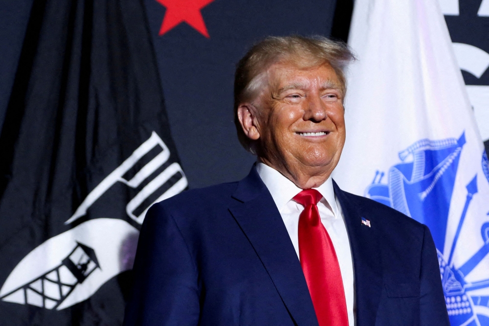 Donald Trump may seek to move the Georgia criminal case in which he is accused of conspiring to overturn his 2020 US election loss from state to federal court — a potentially more favourable venue for the former president, his lawyer said in a court filing on Thursday. — Reuters pic