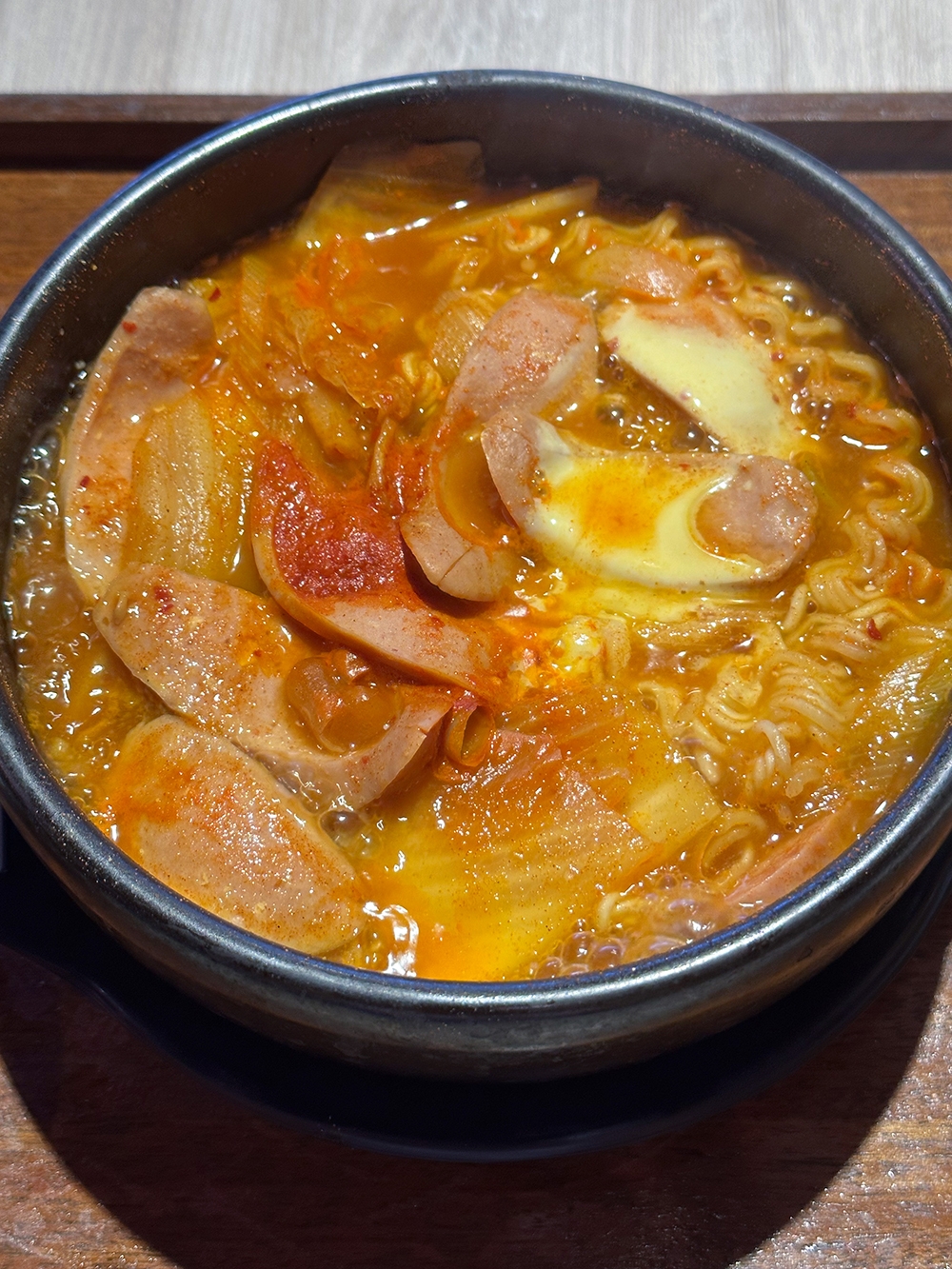 Craving something bubbling hot? There's Korean Army Stew with luncheon meat, cheese, sausages and noodles