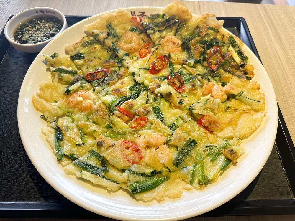 Seafood Chives Jeon has less batter making it more pleasant to eat with the chives and prawns