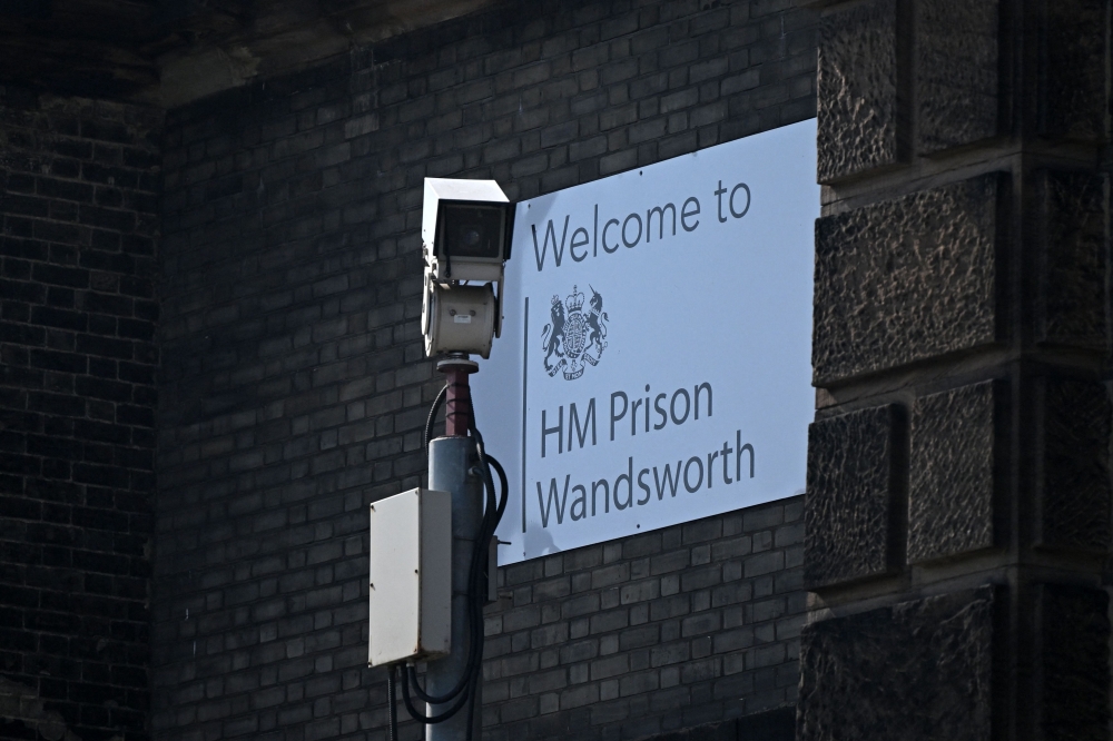 A CCTV camera is seen at the walls of HM Prison Wandsworth in south London on September 7, 2023, a day after terror suspect, Daniel Abed Khalife escaped from the prison while awaiting trial. — AFP pic