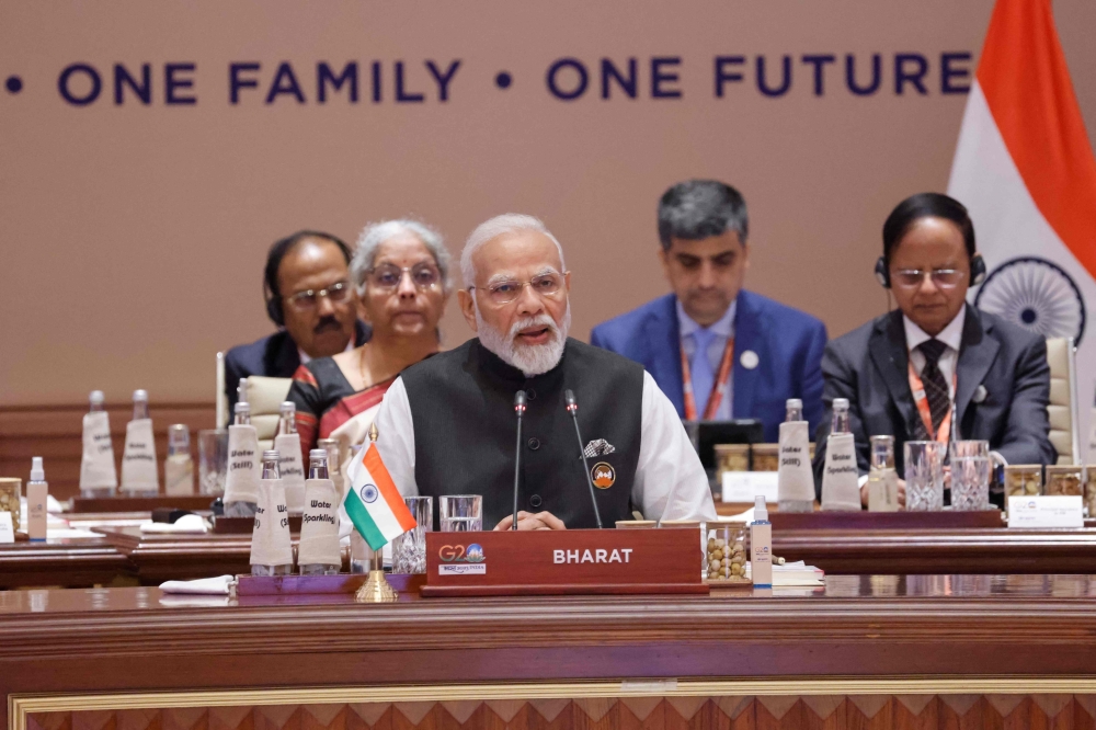 India’s Prime Minister Narendra Modi (centre) speaks during the first session of the G20 Leaders’ Summit at the Bharat Mandapam in New Delhi on September 9, 2023. — AFP pic