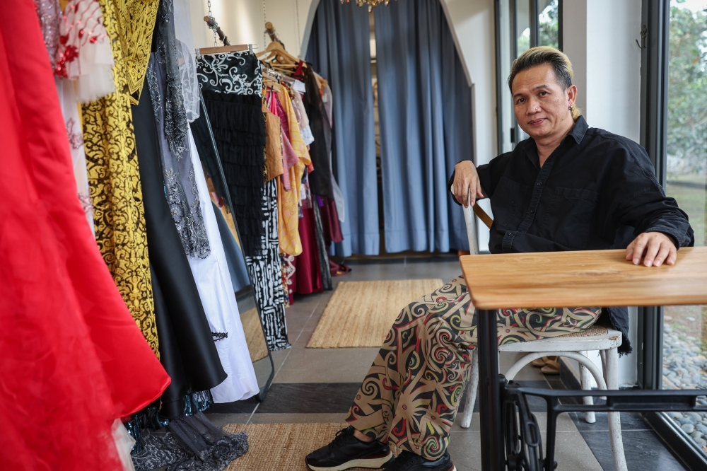 Fashion designer Gilbert Francis Untam poses for a picture during an interview with Bernama at Gilbert Headhunter's clothing boutique @G&Co in Seri Kembangan September 9, 2023. — Bernama pic