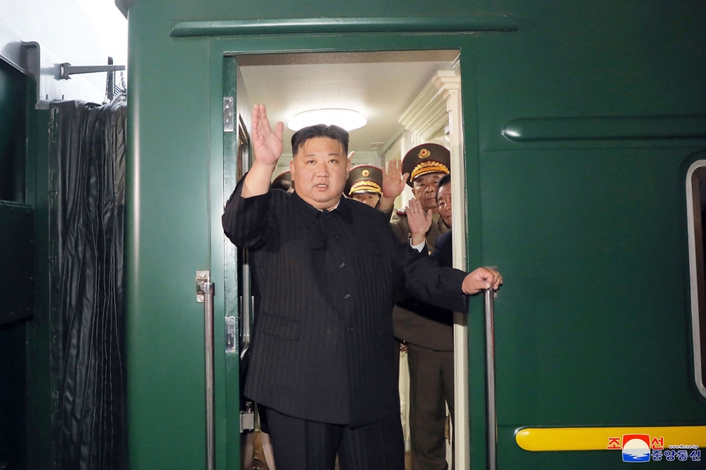 North Korea's leader Kim Jong-un waves as he departs by train from Pyongyang for a visit to Russia. ― KCNA via AFP