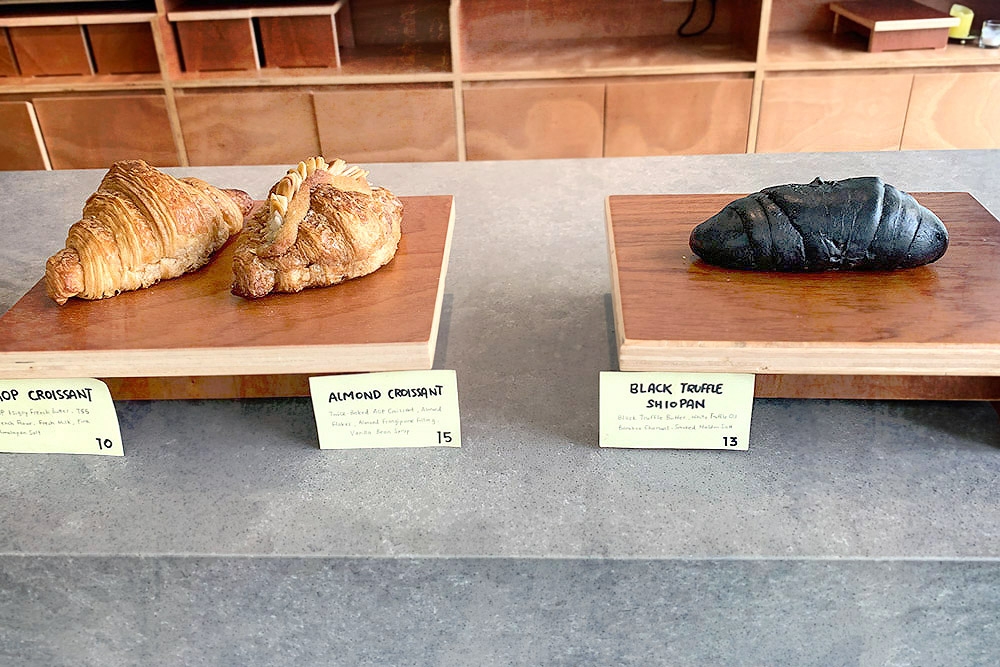 Pastries on display, like art in a gallery.