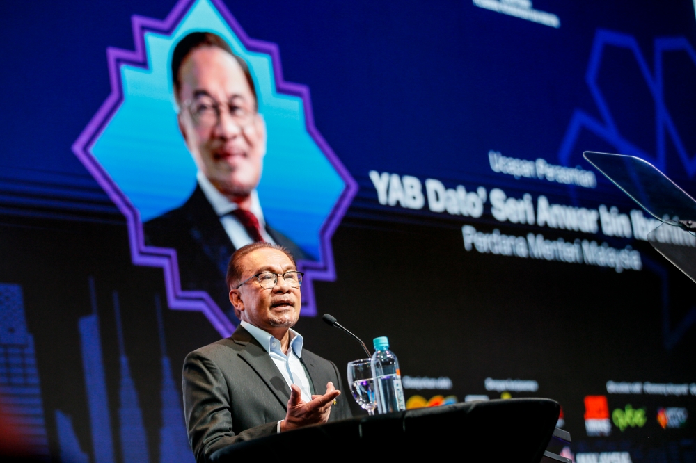 Prime Minister Datuk Seri Anwar Ibrahim delivers his speech at the Global Halal Summit in Kuala Lumpur September 12, 2023.  — Picture by Hari Anggara