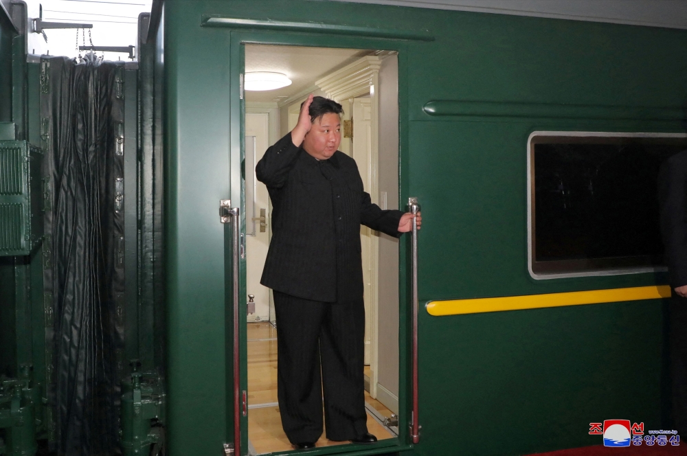 North Korean leader Kim Jong-un waves from a private train as he departs Pyongyang to visit Russia, September 10, 2023, in this image released by North Korea’s Korean Central News Agency September 12, 2023. — KCNA pic via Reuters