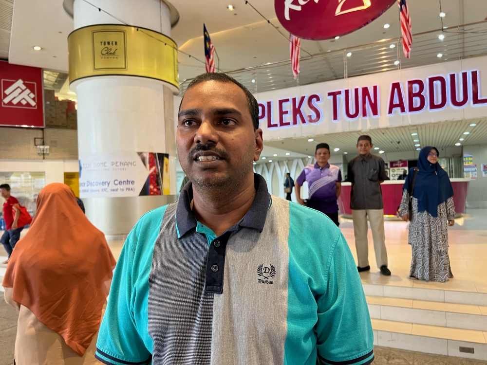 Taman Halaman Indah Action committee chairman, Habibur Rahman Seeni Mohamed, said should the home buyers fail to pay RM21,000 for their house deed, their properties will be auctioned off. — Picture by Opalyn Mok
