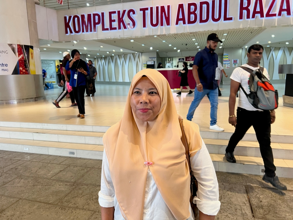 Factory worker Shaharizah Mohamad Saarah said she only wanted to stay in the house she bought in 2010. — Picture by Opalyn Mok