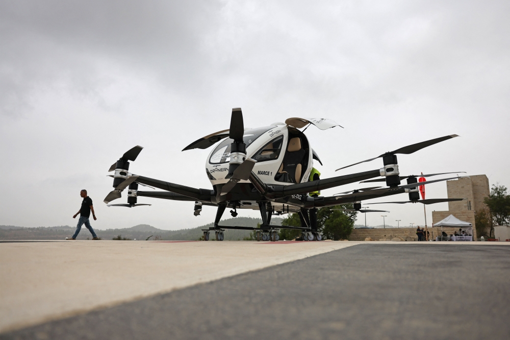 Israel's National Air Drone Initiative (INDI) unveils a drone air taxi at Hadassah Hospital in Jerusalem on September 13, 2023. — AFP pic