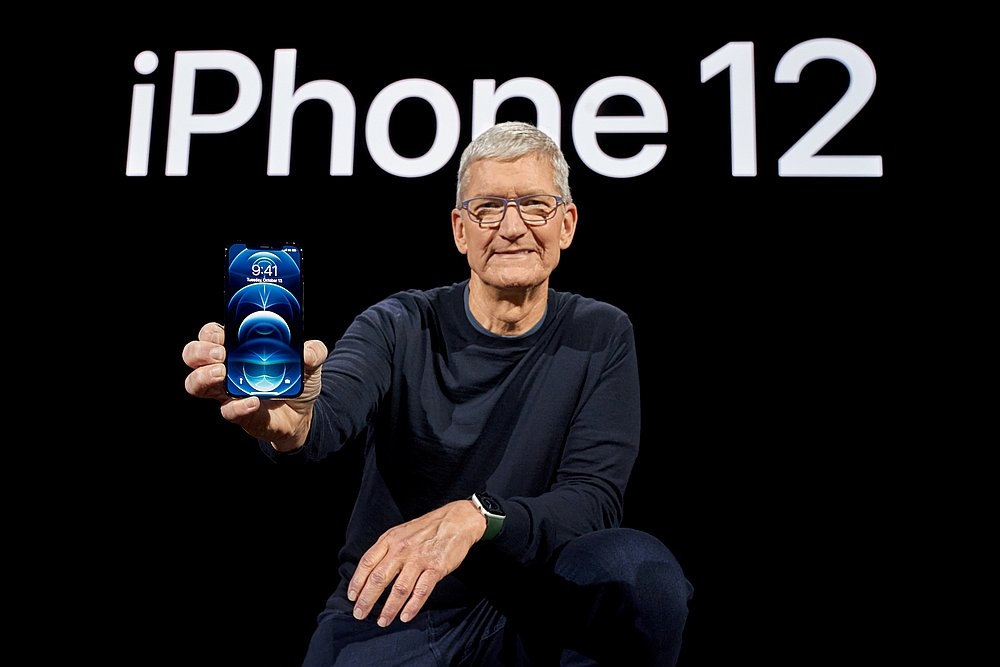 Apple CEO Tim Cook with the all-new iPhone 12 Pro at Apple Park in Cupertino, California October 13, 2020. — Apple Inc handout via Reuters