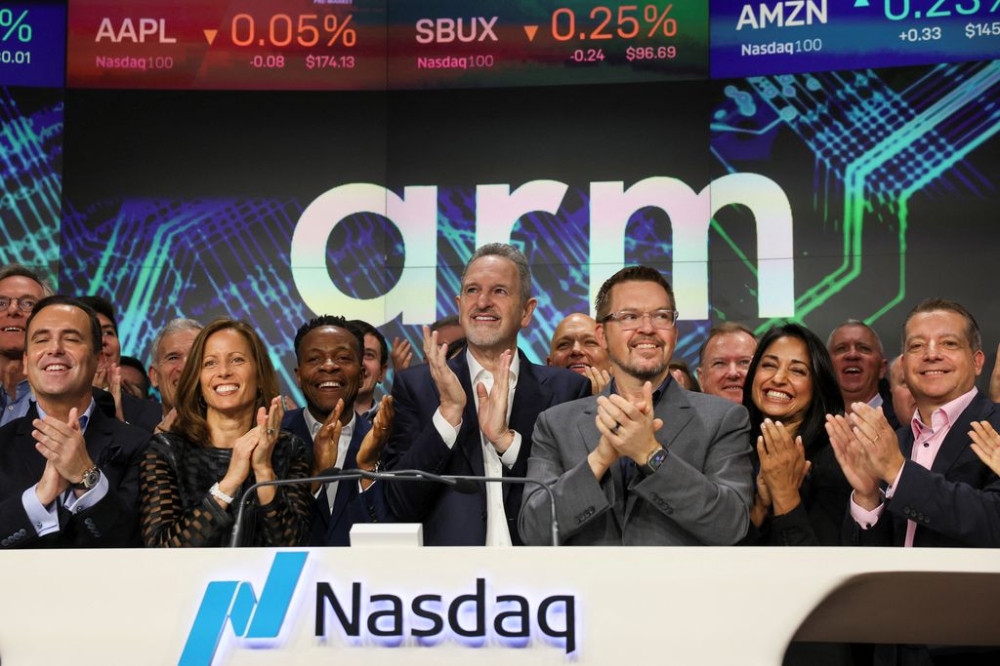 Arm CEO Rene Haas and executives cheer, as Softbank's Arm, chip design firm, holds an initial public offering (IPO) at Nasdaq Market site in New York, US, September 14, 2023. — Reuters pic
