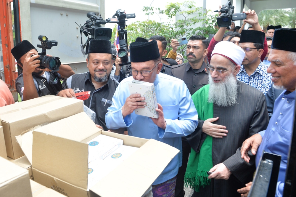 Prime minister Datuk Seri Anwar Ibrahim is seen at the One Million Al-Quran Waqf Solidarity programme in Putrajaya September 15, 2023. — Picture by Miera Zulyana