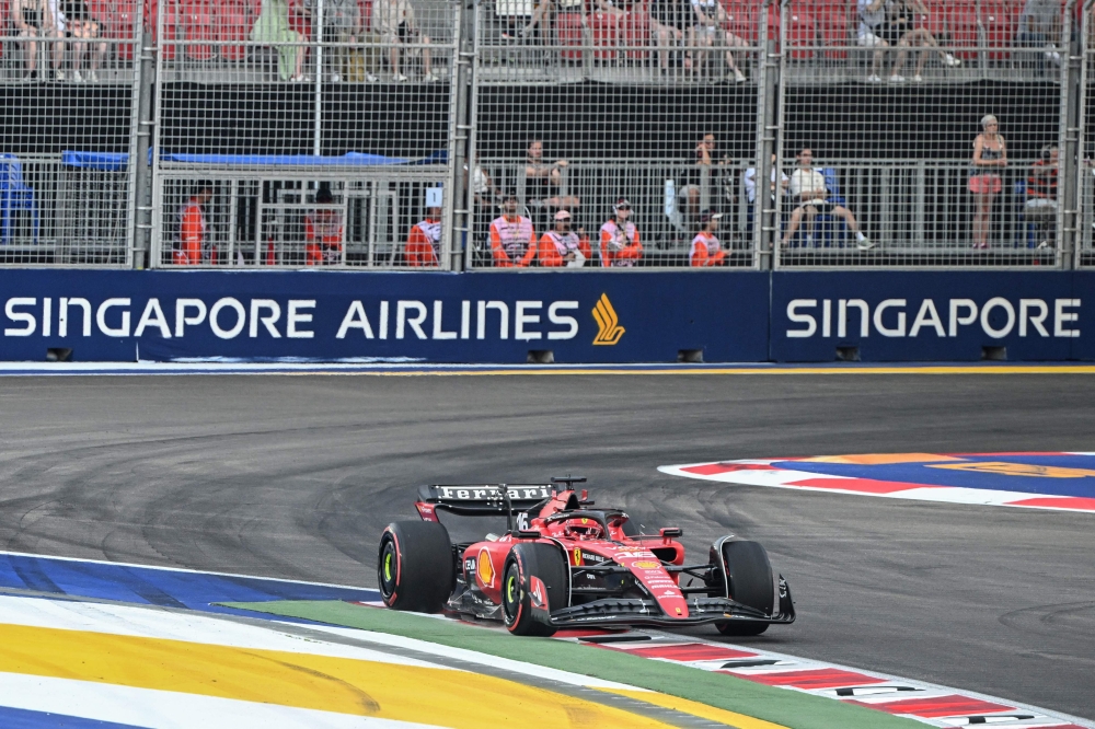 Ferrari's Monegasque driver Charles Leclerc drives during the first practice session of the Singapore Formula One Grand Prix night race at the Marina Bay Street Circuit in Singapore September 15, 2023. — AFP pic