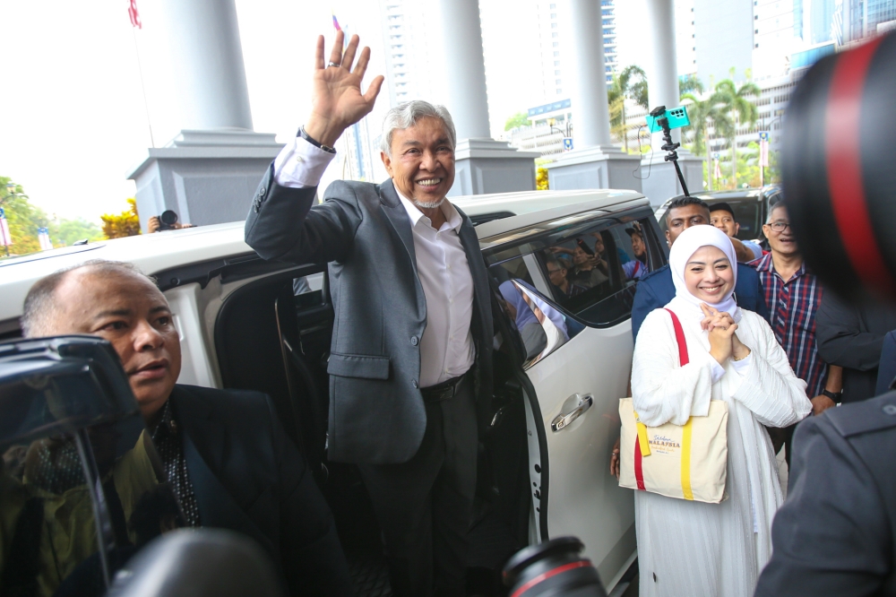 Several group are organising the ‘Save Malaysia’ rally today to protest the discharge not amounting to acquittal granted to Deputy Prime Minister Datuk Seri Ahmad Zahid Hamidi (centre) over the 47 charges in his Yayasan Akalbudi trial. — Picture by Ahmad Zamzahuri