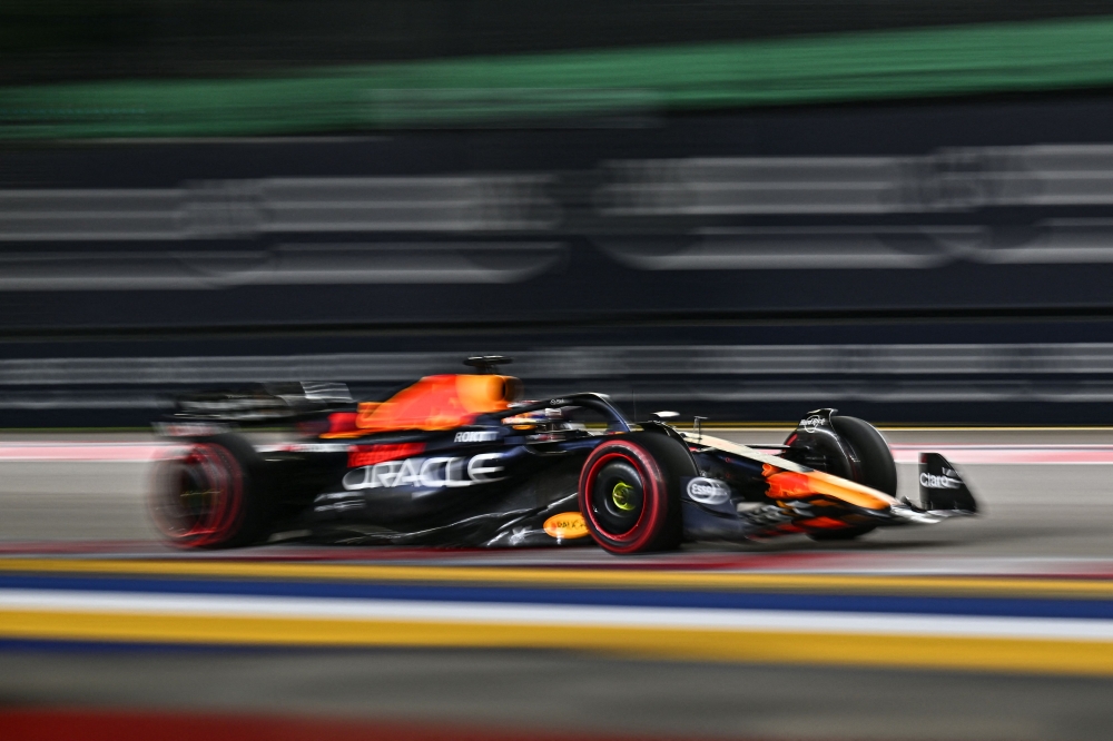 Red Bull Racing’s Dutch driver Max Verstappen drives during the qualifying session of the Singapore Formula One Grand Prix night race at the Marina Bay Street Circuit in Singapore on September 16, 2023. — AFP pic
