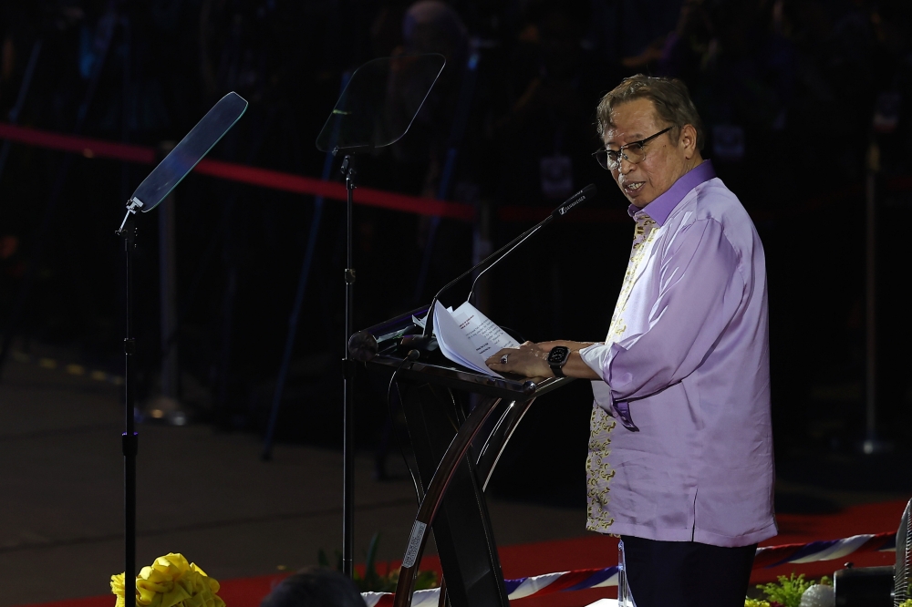 Sarawak Premier Tan Sri Abang Johari Openg delivers his speech during the national-level Malaysia Day 2023 celebration at the Perpaduan Stadium in Kuching September 16, 2023. — Bernama pic