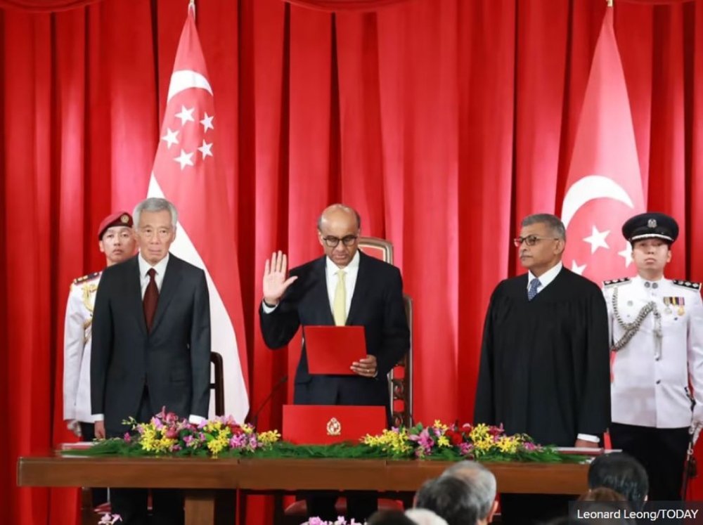 Mr Tharman Shanmugaratnam being sworn in as Singapore's ninth President on Thursday (Sept 14), at the Istana. — TODAY pic