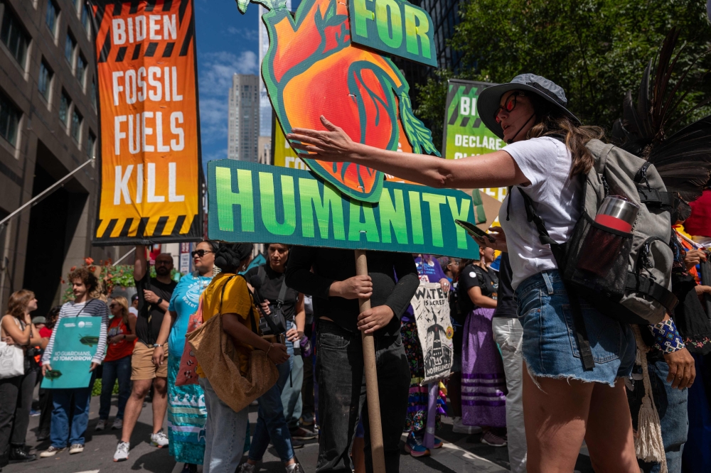 Thousands of activists, indigenous groups, students and others take to the streets of New York for the 'March to End Fossil Fuels' protest on September 17, 2023 in New York City. — AFP pic