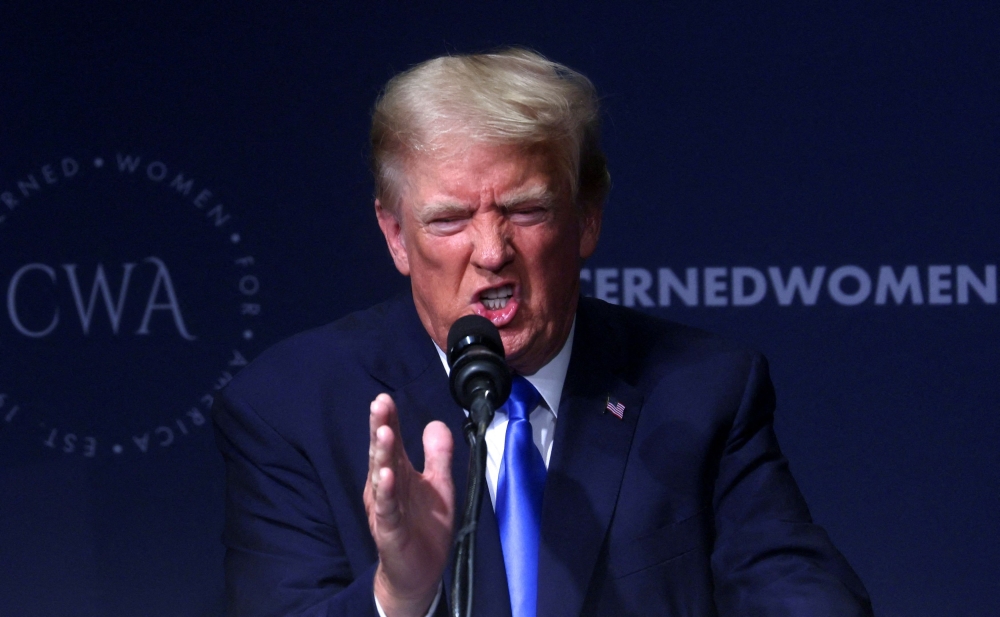 Former US President and Republican presidential candidate Donald Trump delivers a speech at the Concerned Women for America Legislative Action Committee's (CWALAC) 2023 Leadership Summit in Washington September 15, 2023. — Reuters pic