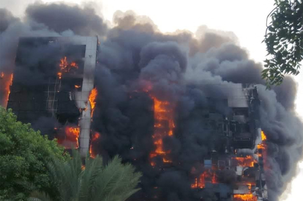 This picture taken on September 17, 2023 shows a raging fire at the Greater Nile Petroleum Oil Company Tower in Khartoum. — AFP pic