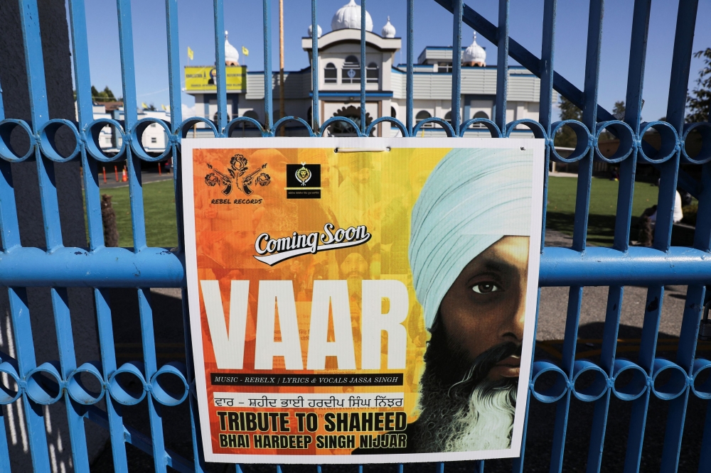A sign outside the Guru Nanak Sikh Gurdwara temple is seen after the killing on its grounds in June 2023 of Sikh leader Hardeep Singh Nijjar, in Surrey, British Columbia, Canada September 18, 2023. ― Reuters pic