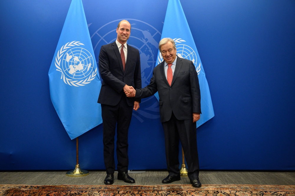 Britain's Prince William, Prince of Wales, shakes hands with United Nations Secretary General Antonio Guterres during a meeting at United Nations headquarters in New York September 18, 2023. ― Ed Jones/Pool via Reuters