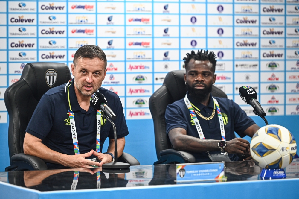 Terengganu FC head coach Tomislav Steinbruckner with Terengganu FC player Habib Haroon Haroon Saeed at the 2023 AFC Cup pre-match press conference in Kuala Nerus, September 19, 2023. — Bernama pic 