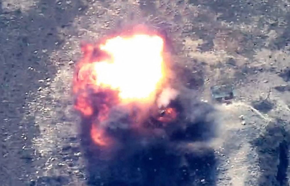 This grab taken from a handout footage released by the Azerbaijani Defence Ministry on September 19, 2023 show an explosion in mountainous terrain, that Baku claims to be Azerbaijani forces ‘destroying positions’ used by Armenians in the Nagorno-Karabakh region. Azerbaijan said on September 19, 2023 it had launched ‘anti-terrorist operations’ in the disputed region, over which the Caucasus arch-rivals fought a brief but brutal war in 2020. — Azerbaijani Defence Ministry handout pic via AFP