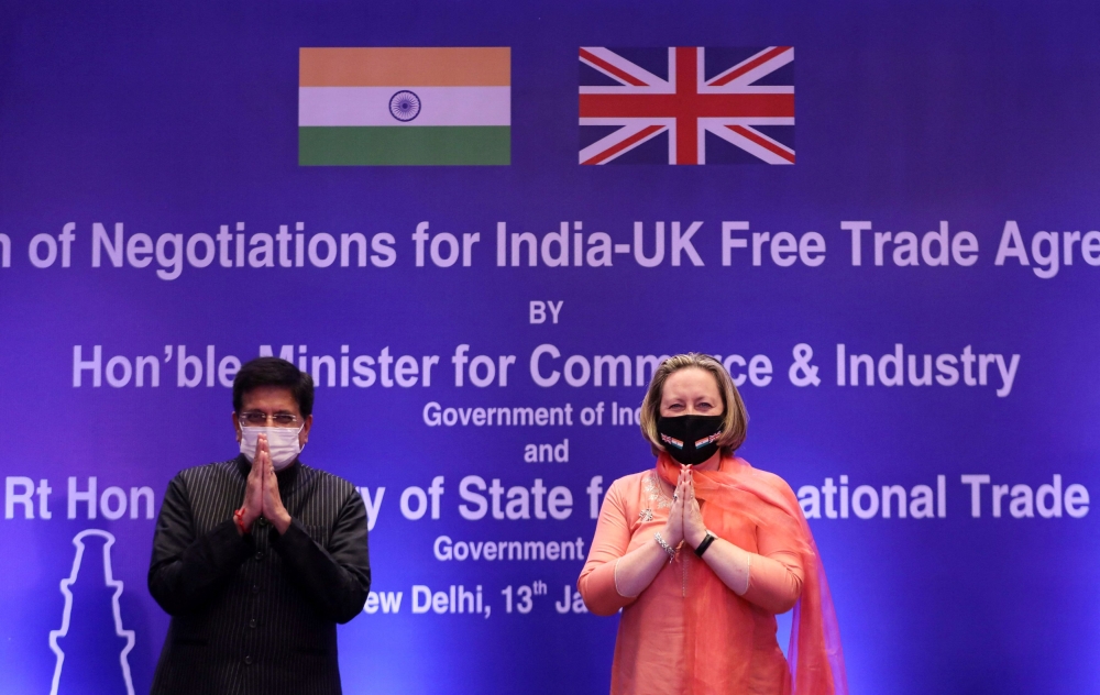 India's Minister of Commerce and Industry, Piyush Goyal, and British Secretary of State for International Trade Anne-Marie Trevelyan pose for a picture during the launch of free trade agreement (FTA) negotiations between the United Kingdom and India during an event at a hotel in New Delhi in this file photo taken on January 13, 2022. — Reuters pic