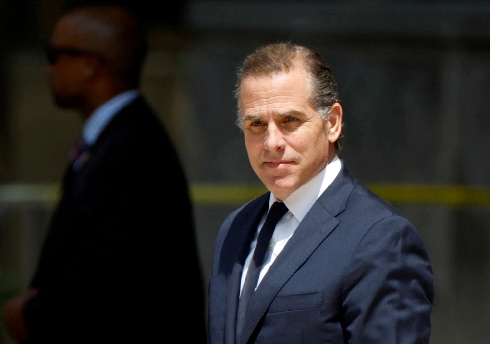US President Joe Biden’s son Hunter will plead not guilty to charges of illegally buying a gun when he was using drugs, his lawyer said yesterday. — Reuters pic
