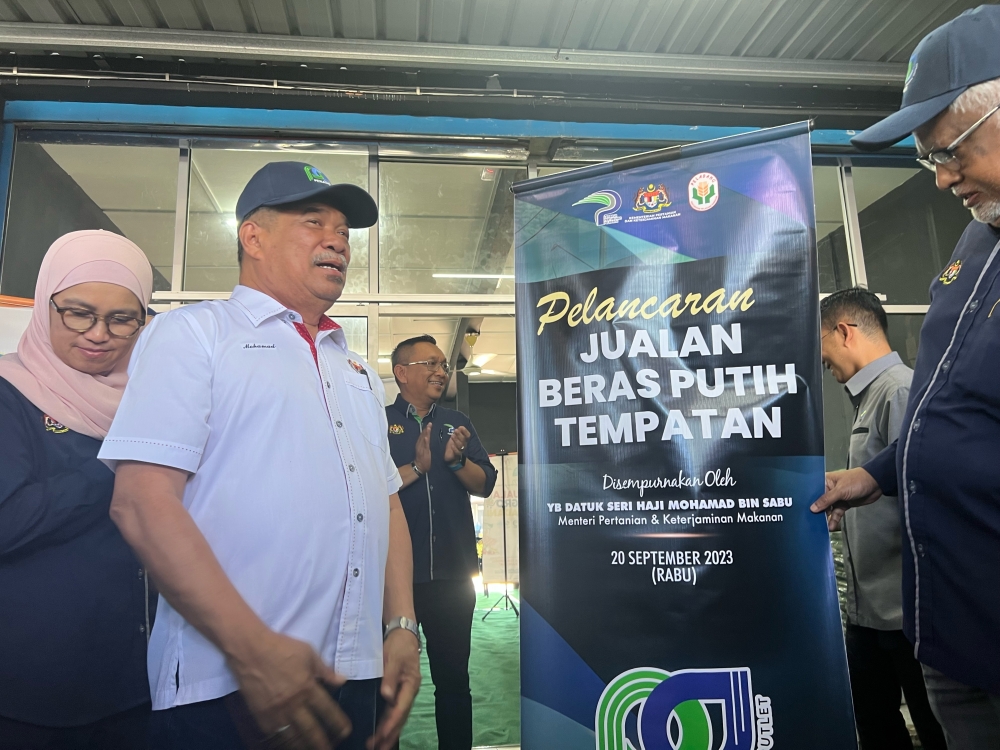 Agriculture and Food Security Minister Datuk Seri Mohamad Sabu launched the first local white rice intervention initiative in Kepala Batas today. — Picture by Opalyn Mok