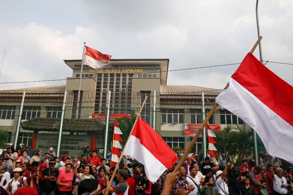 File picture shows supporters of Jakarta Governor Basuki Tjahaja Purnama, also known as Ahok, protesting outside Cipinang Prison, where he was taken following his conviction of blasphemy in Jakarta, Indonesia May 9, 2017. — Reuters pic