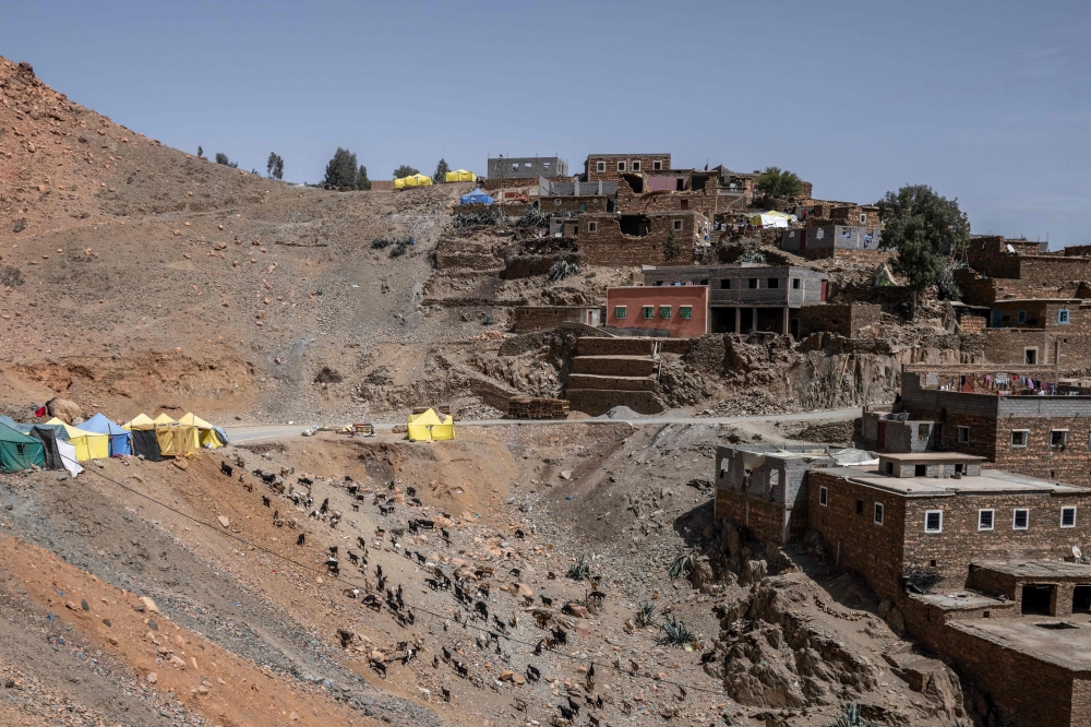 Tents sit next to the road in the earthquake-hit village of Imi N’Tala on September 19, 2023. — AFP pic