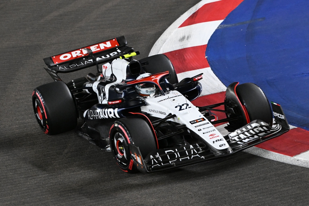 Alpha Tauri’s Japanese driver Yuki Tsunoda drives during the qualifying session of the Singapore Formula One Grand Prix night race at the Marina Bay Street Circuit in Singapore on September 16, 2023. — AFP pic 