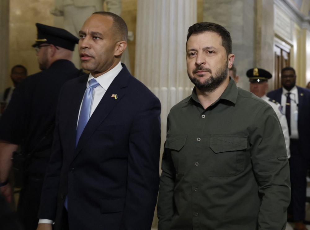 President of Ukraine Volodymyr Zelensky (right) walks with Minority Leader Rep. Hakeem Jeffries (D-NY) as he arrives for a meeting with members of the US House of Representatives at the US Capitol on September 21, 2023 in Washington, DC. President Zelensky is in the nation's capital to meet with lawmakers after attending the United Nations General Assembly in New York. — AFP pic